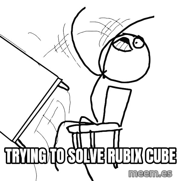 Desk Flip Rage Guy meme: trying to solve rubix cube
